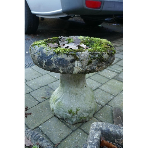 1063 - A quantity of reconstituted stone composition and concrete garden figures, planters and bird bath, A... 