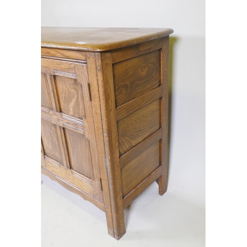 1082 - An Ercol 'Old Colonial' elm two door buffet, 122 x 45cm, 84cm high