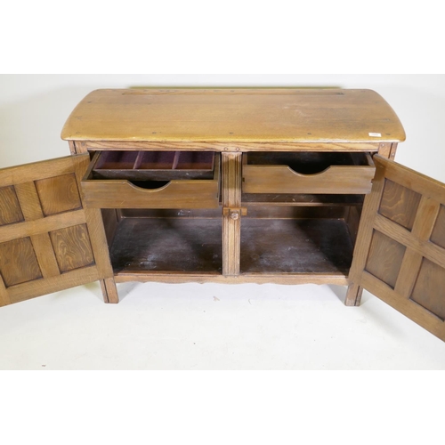 1082 - An Ercol 'Old Colonial' elm two door buffet, 122 x 45cm, 84cm high