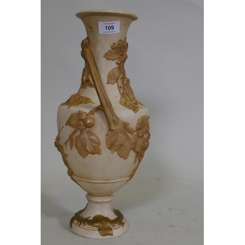 109 - A Royal Dux two handled amphora vase, with raised floral parcel gilt decoration on a buff glaze, mar... 