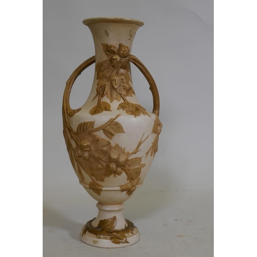 109 - A Royal Dux two handled amphora vase, with raised floral parcel gilt decoration on a buff glaze, mar... 