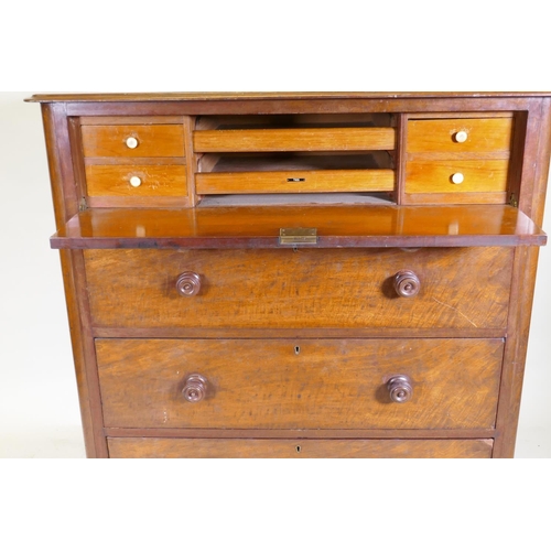 1101 - A Victorian mahogany dressing chest, the upper drawer with full front revealing four drawers flankin... 