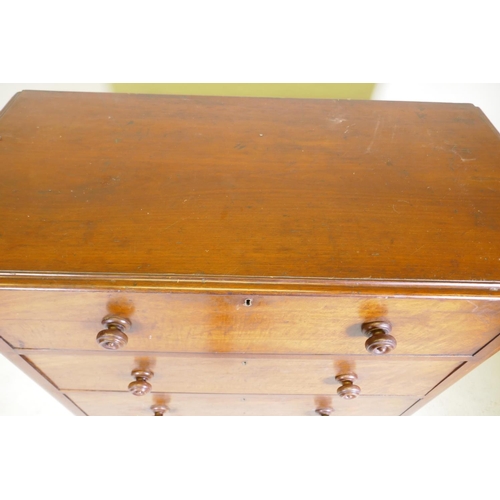 1101 - A Victorian mahogany dressing chest, the upper drawer with full front revealing four drawers flankin... 