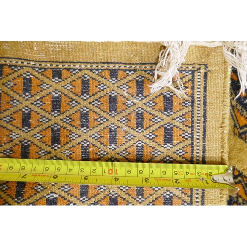 1106 - A gold ground Bokhara rug, 120 x 190cm