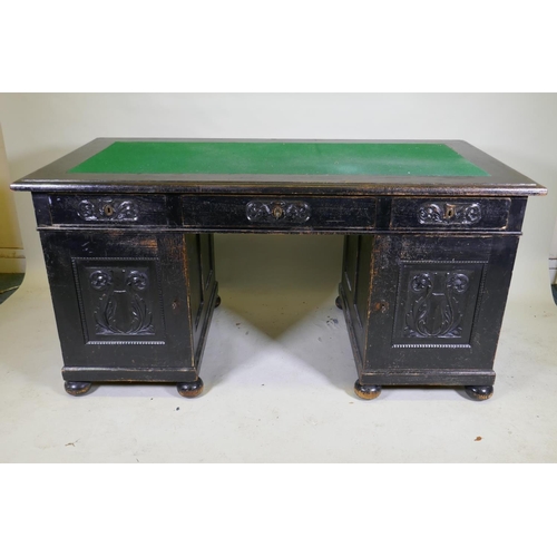 1119 - A C19th continental stained pine pedestal desk, with three drawers and two cupboards, one fitted wit... 