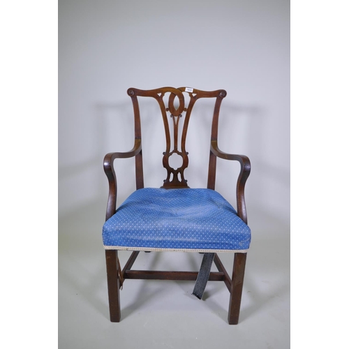 1121 - An C18th mahogany elbow chair, adapted, 98cm high