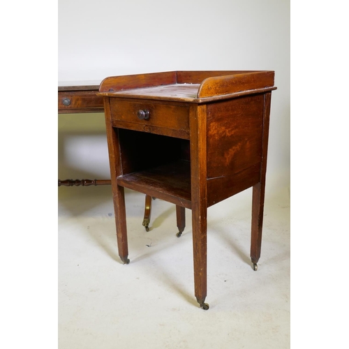 1130 - An inlaid mahogany Regency style sofa table with two drawers, raised on lyre shaped end supports, an... 