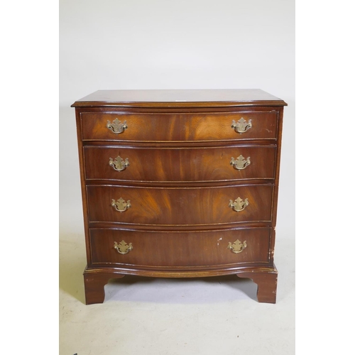 1132 - A mahogany serpentine front chest of four drawers, with brass plate handles, raised on bracket suppo... 