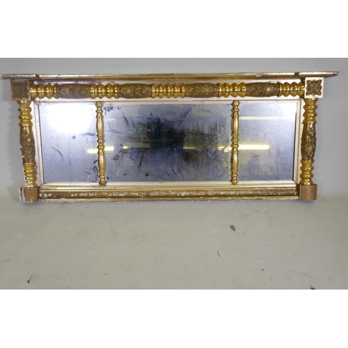 1134 - A Regency water gilt triple overmantel mirror, with raised composition decoration and original glass... 