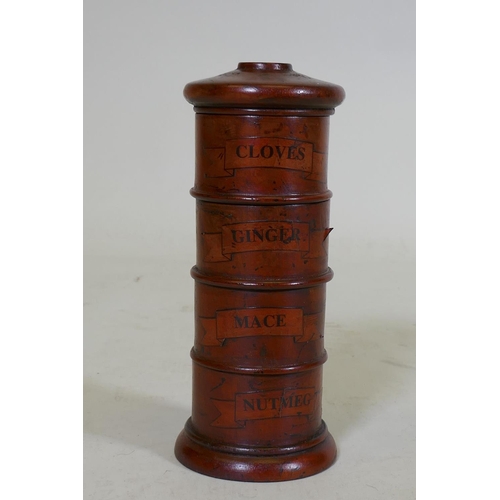 114 - A treen spice tower with four compartments, 20cm high