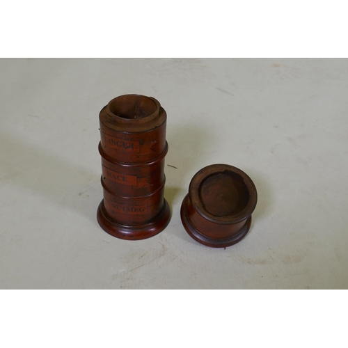 114 - A treen spice tower with four compartments, 20cm high