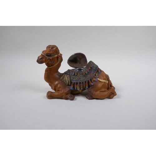 117 - A cold painted bronze inkwell in the form of a camel, 21cm long