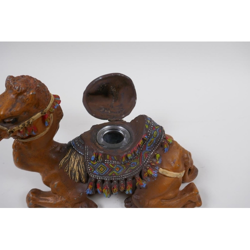 117 - A cold painted bronze inkwell in the form of a camel, 21cm long