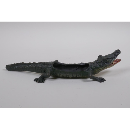 119 - A cold painted bronze pin tray in the form of a crocodile, in the manner of Bergman, 22cm long