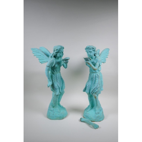 122 - A pair of cast iron garden fairies with applied verdigris patina, AF, 50cm high