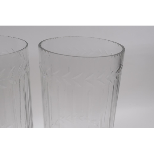 142 - A pair of glass hurricane vases with cut glass decoration, 34cm high, 12cm high