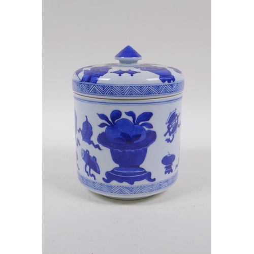 143 - A Chinese blue and white porcelain cylinder pot and cover decorated with objects of virtue, 16cm hig... 