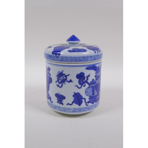 143 - A Chinese blue and white porcelain cylinder pot and cover decorated with objects of virtue, 16cm hig... 