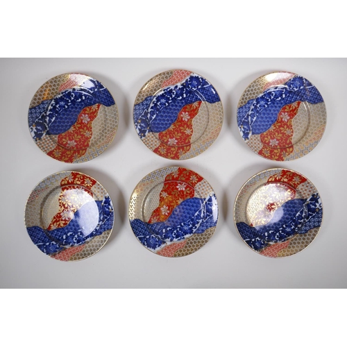 144 - A set of six Japanese Imari side plates, mark to base, 17cm diameter