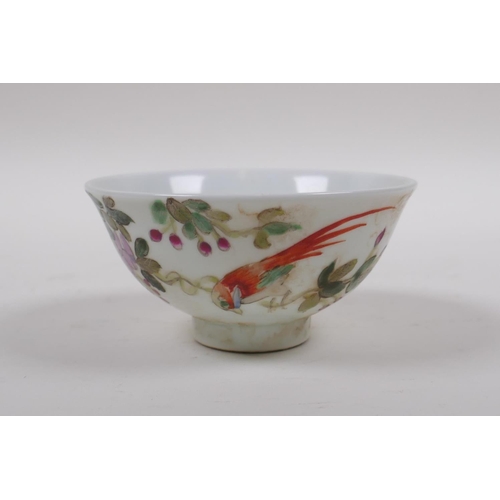 148 - An early C20th famille vert porcelain tea bowl decorated with birds amongst flowers, Chinese GuangXu... 