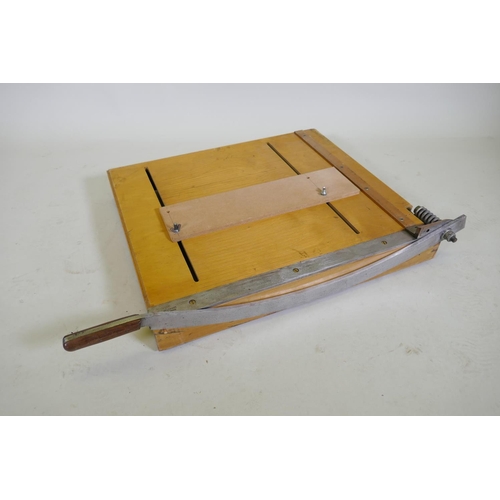 151 - A mid century pine Dryad table top guillotine, 70 x 64cm