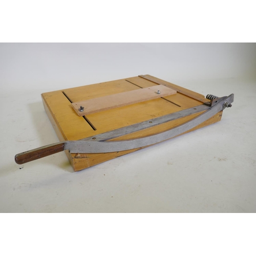 151 - A mid century pine Dryad table top guillotine, 70 x 64cm