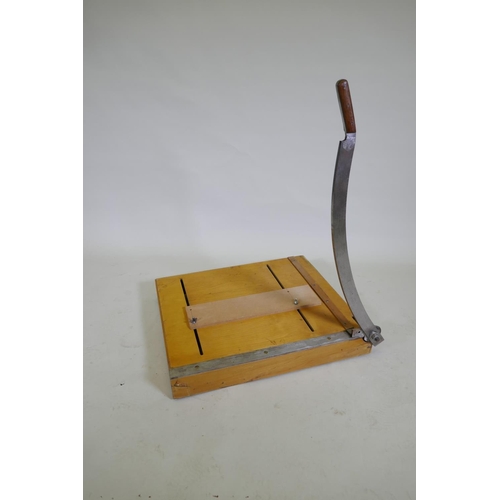 151 - A mid century pine Dryad table top guillotine, 70 x 64cm