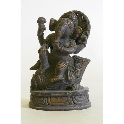 169 - A bronze figure of Ganesh, 12cm high