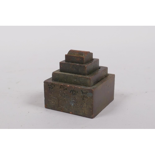 170 - A nest of four Chinese bronze seals, 4 x 4cm