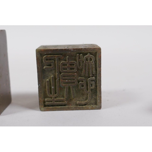 170 - A nest of four Chinese bronze seals, 4 x 4cm