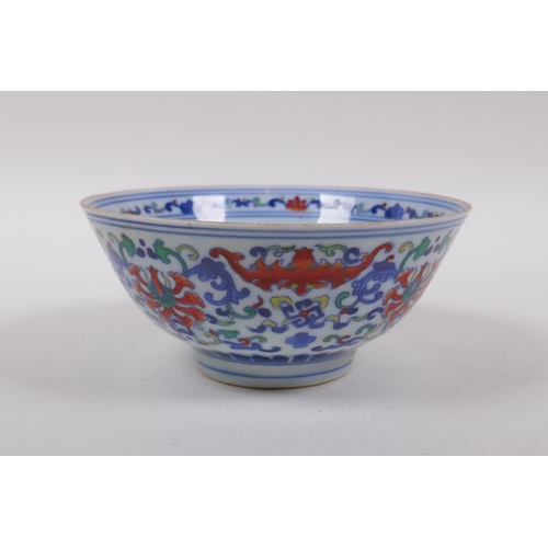 178 - A Doucai porcelain rice bowl decorated with bats and lotus flowers, Chinese YongZheng 6 character ma... 