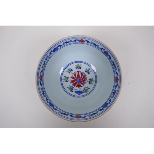 178 - A Doucai porcelain rice bowl decorated with bats and lotus flowers, Chinese YongZheng 6 character ma... 