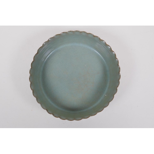 188 - A Chinese celadon crackle glazed porcelain bowl of ribbed form, 18cm diameter