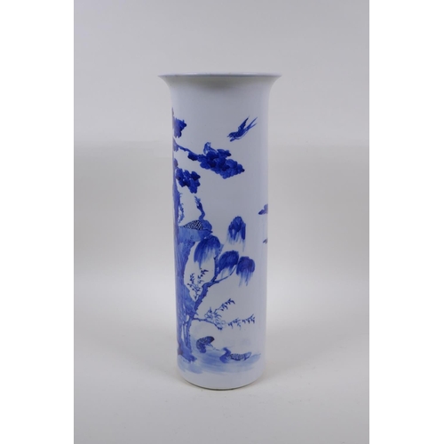 19 - A Chinese late C19th/early C20th blue and white porcelain cylinder vase decorated with a phoenix and... 