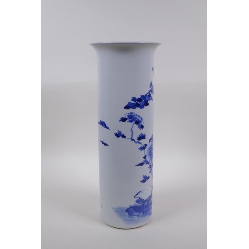 19 - A Chinese late C19th/early C20th blue and white porcelain cylinder vase decorated with a phoenix and... 