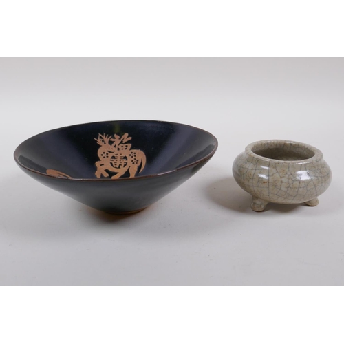 195 - A Chinese Jian kiln conical bowl with deep and auspicious character decoration, 15cm diameter, and a... 