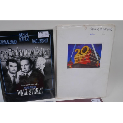 196 - A collection of film programs, promotional books and film stills photographs, including Wall Street,... 