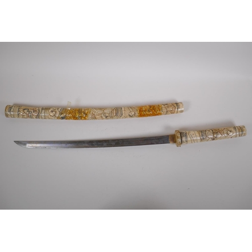 197 - A Japanese Wakizashi sword with a carved bone scabbard, handle and tsuba, AF, blade length 48cm