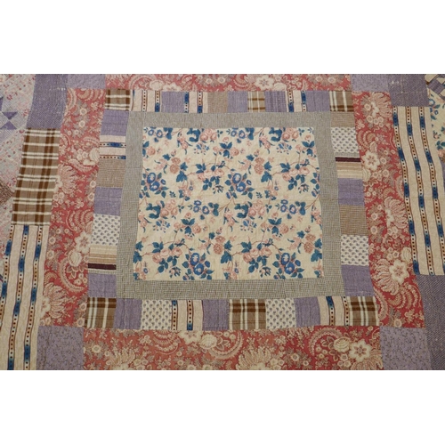 2 - A Victorian/early C20th hand stitched patchwork quilt, 250 x 218cm