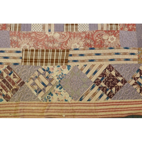 2 - A Victorian/early C20th hand stitched patchwork quilt, 250 x 218cm