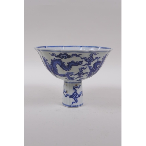 200 - A Chinese blue and white porcelain stem bowl of lobed form decoration with dragons, Yongle mark to t... 