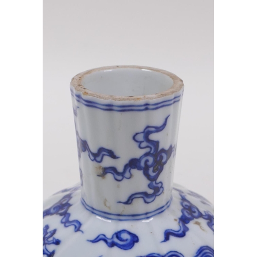 200 - A Chinese blue and white porcelain stem bowl of lobed form decoration with dragons, Yongle mark to t... 