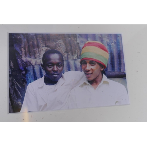 201 - A collection of Bob Marley memorabilia including photographs, prints etc, largest 40 x 60cm