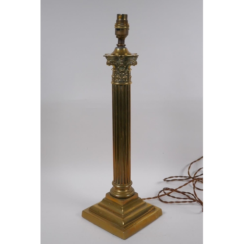 202 - A brass Corinthian column table lamp, 48cm high