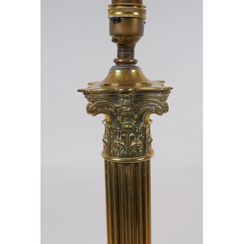 202 - A brass Corinthian column table lamp, 48cm high