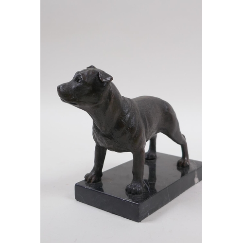 207 - A filled bronze figure of a Staffordshire Bull Terrier, on a marble base, 17cm long