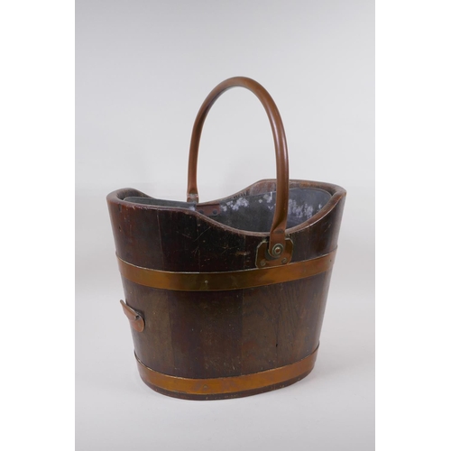 212 - A C19th shaped oak and copper bound coal bucket, 37 x 32cm, 45cm high