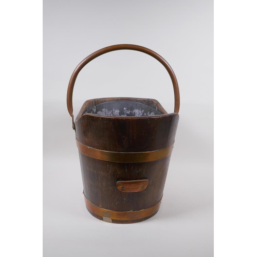 212 - A C19th shaped oak and copper bound coal bucket, 37 x 32cm, 45cm high