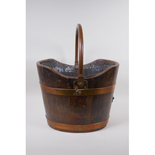 212 - A C19th shaped oak and copper bound coal bucket, 37 x 32cm, 45cm high