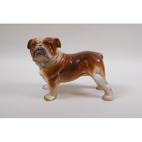 213 - A painted cast iron bull dog, 22cm long